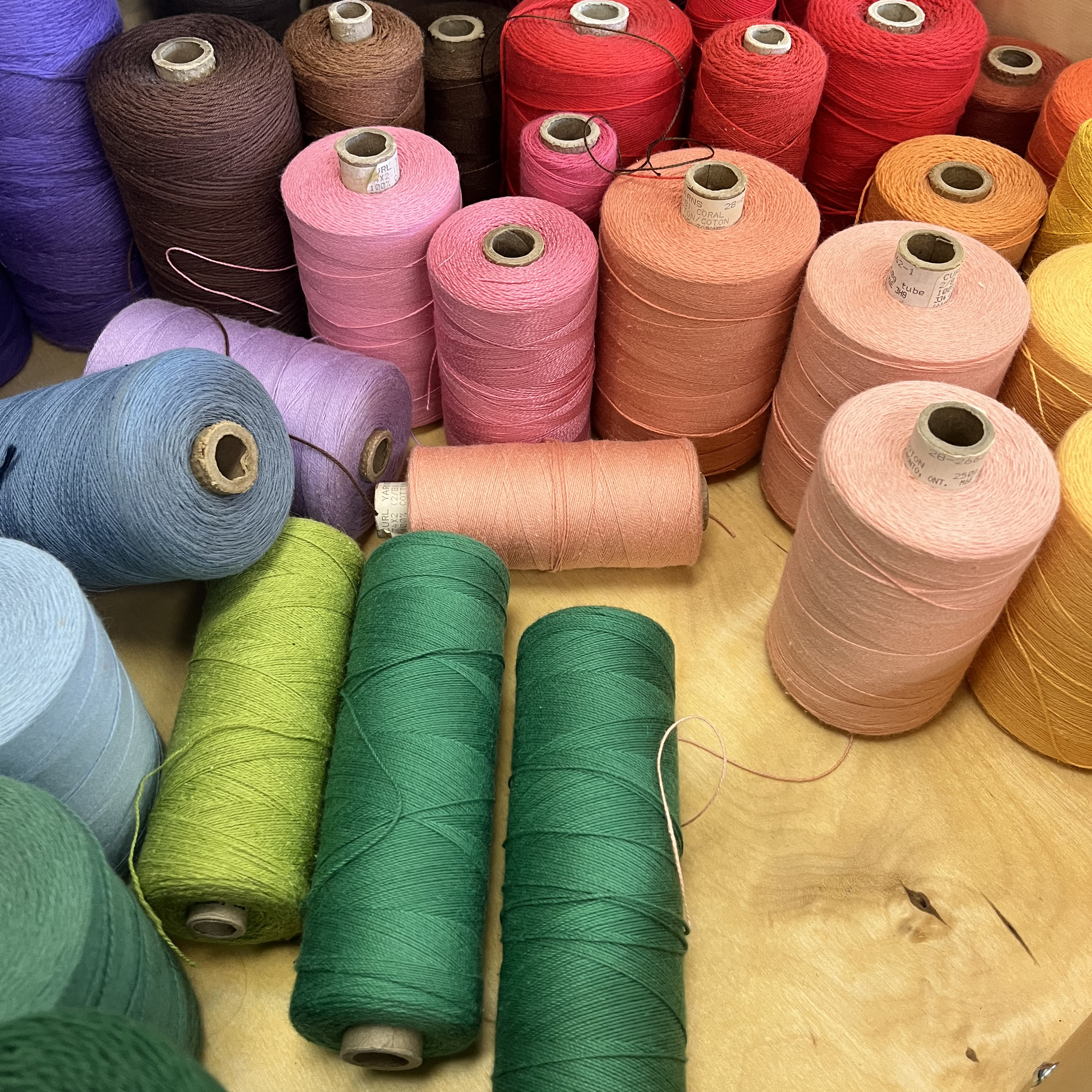 This is the un-mercerized cotton, which you can see lacks the shiny lustre of the mercerized cotton. Un-mercerized cotton is commonly used for fabrics where you want more absorbency, like towels, as it has better moisture absorption properties. It is softer than mercerized cotton too, so it's sought out for fabrics where softness is an important factor. It's matte texture makes it suitable for anyone that wants a more homemade or vintage appearance, and it is a lower cost fabric than mercerized cotton.